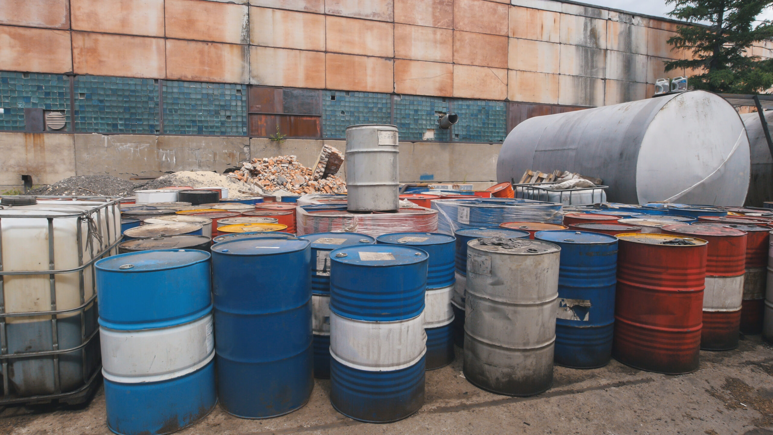 Drums of spent solvent awaiting recycling